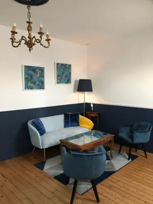 Coin salon dans l'établissement L'Appart'Mans, luxueux, spacieux, bien situé