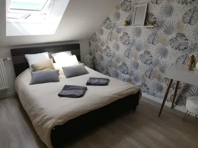 Un ou plusieurs lits dans un hébergement de l'établissement Chambre chez particulier proche du circuit 3