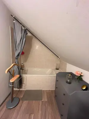 Coin salon dans l'établissement Gîte romantique avec jacuzzi privatif ambiance loveroom