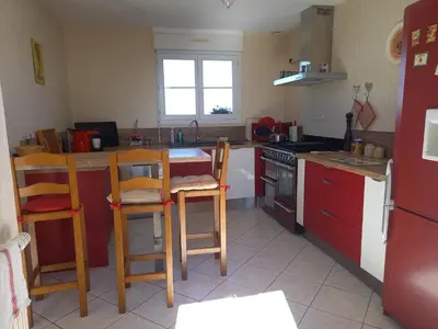 Cuisine ou kitchenette dans l'établissement chambre d'hôte trôo