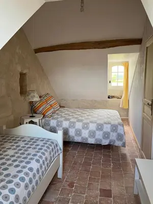 Un ou plusieurs lits dans un hébergement de l'établissement Manoir de Valette