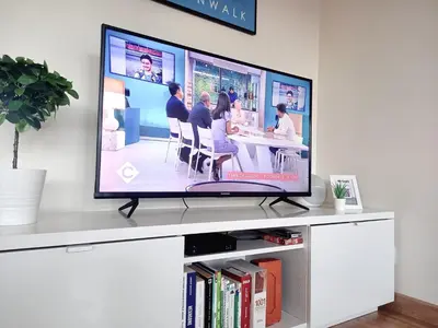 Télévision ou salle de divertissement dans l'établissement Le Globe Trotter - Tours