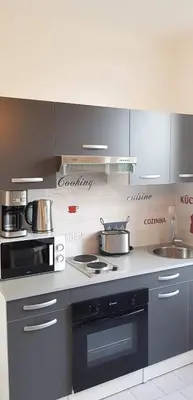 Cuisine ou kitchenette dans l'établissement La Petite Corderie Calme, Parking Gratuit