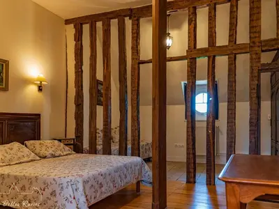 Un ou plusieurs lits dans un hébergement de l'établissement Gîte de charme avec piscine chauffée et sauna, au cœur d'une propriété historique en Val de Loire - FR-1-381-128