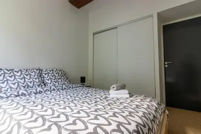 Un ou plusieurs lits dans un hébergement de l'établissement Maison au pied du Château-Cour-Proche Centre Ville