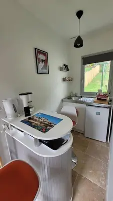 Cuisine ou kitchenette dans l'établissement Le Petit Paradis