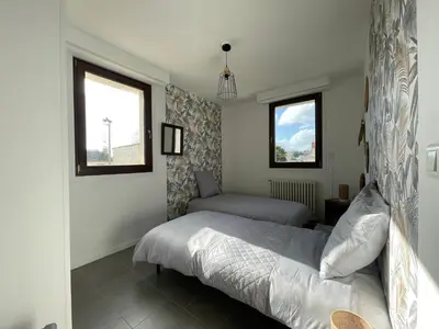 Un ou plusieurs lits dans un hébergement de l'établissement Grand appartement en vallée de la loire