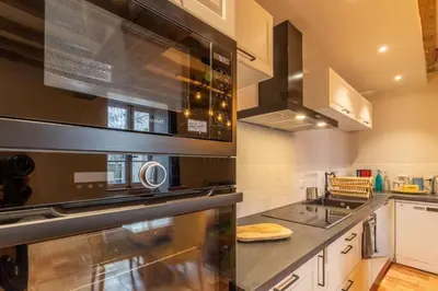 Cuisine ou kitchenette dans l'établissement Gîte Apolize