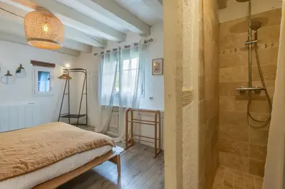 Un ou plusieurs lits dans un hébergement de l'établissement Le Cottage de Chitenay