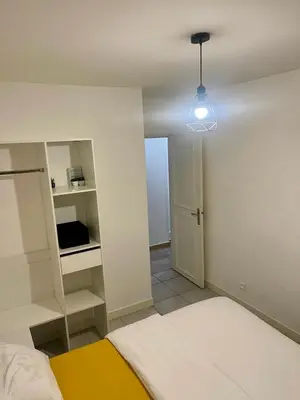 Un ou plusieurs lits dans un hébergement de l'établissement Harmonie apparte