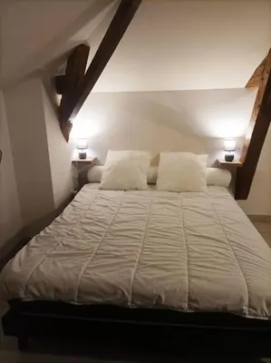 Un ou plusieurs lits dans un hébergement de l'établissement Studio en pleine campagne avec jardin privatif