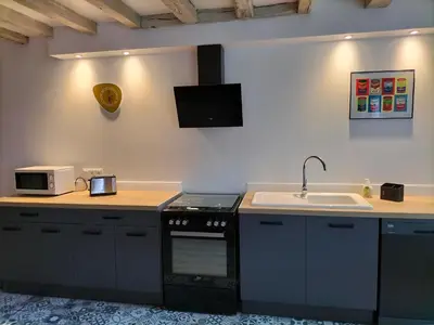 Cuisine ou kitchenette dans l'établissement Les prés du petit Morlu - proche Beauval