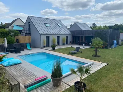 Piscine de l'établissement Appartement à l'étage de notre maison ou située à proximité