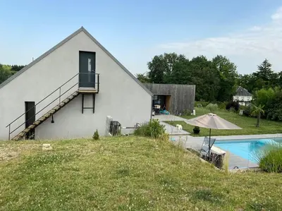 Piscine de l'établissement Appartement à l'étage de notre maison ou située à proximité