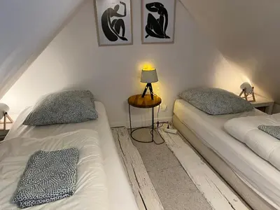 Un ou plusieurs lits dans un hébergement de l'établissement La Scellerie, le charme au cœur de Tours