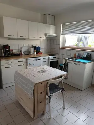 Cuisine ou kitchenette dans l'établissement Le Blason du Poête