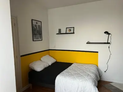 Un ou plusieurs lits dans un hébergement de l'établissement MAISON 4 chambres 12 pers à 2,8KM DU CIRCUIT et proche BOULERIES JUMP