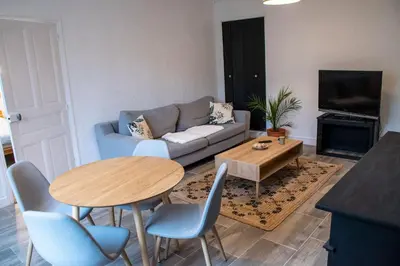 Coin salon dans l'établissement Gîte rénové avec piscine au cœur de Vendôme