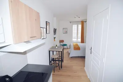 Un ou plusieurs lits dans un hébergement de l'établissement Studios Lsquare Residence AFPA