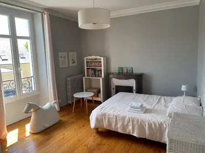 Un ou plusieurs lits dans un hébergement de l'établissement Grande maison hyper centre