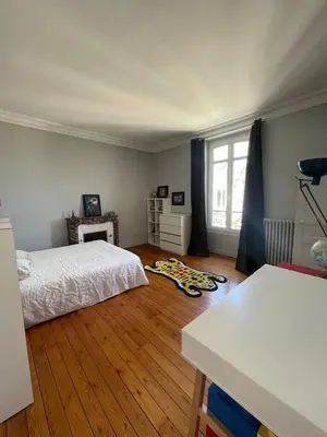 Un ou plusieurs lits dans un hébergement de l'établissement Grande maison hyper centre