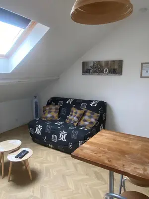 Coin salon dans l'établissement Le Loge'Mans