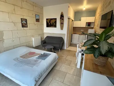 Un ou plusieurs lits dans un hébergement de l'établissement Guest House de Céline et Benoît