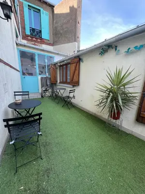 Jardin de l'établissement Le petit abri de la Garenne - Séjour cosy à Blois