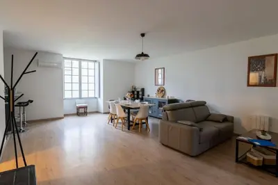 Coin salon dans l'établissement Superbe Appartement