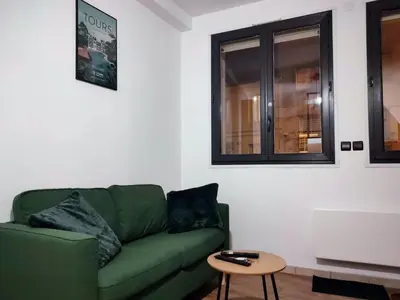Coin salon dans l'établissement Très beau studio quartier Cathédrale bord de Loire