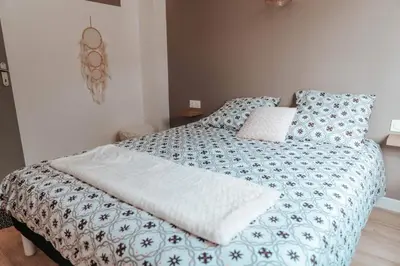 Un ou plusieurs lits dans un hébergement de l'établissement Le petit rempart - Appt lumineux 2pers au coeur de Blois