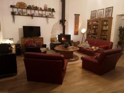 Coin salon dans l'établissement la Ferme du Grand Bois