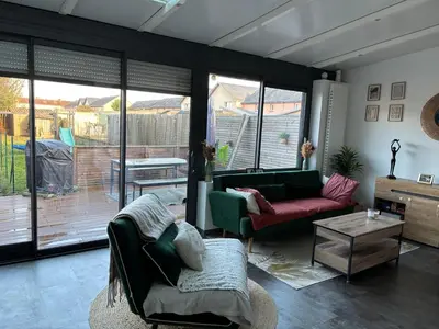 Coin salon dans l'établissement Maison à 2km du circuit des 24h
