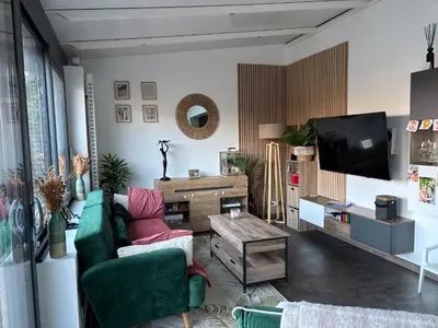 Télévision ou salle de divertissement dans l'établissement Maison à 2km du circuit des 24h