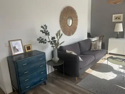 Coin salon dans l'établissement Appartement LE JULES FAVRE