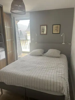 Un ou plusieurs lits dans un hébergement de l'établissement Appartement LE JULES FAVRE