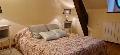 Un ou plusieurs lits dans un hébergement de l'établissement Gîte d'Isabelle, dépendance du château de la Mézière