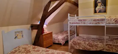Un ou plusieurs lits dans un hébergement de l'établissement Gîte de groupe du Château de la Mézière