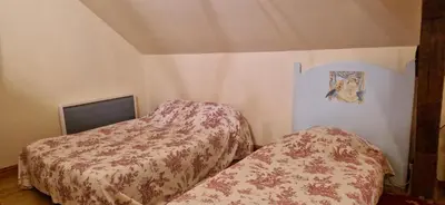 Un ou plusieurs lits dans un hébergement de l'établissement Gîte de groupe du Château de la Mézière