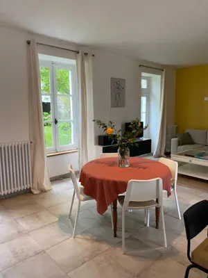 Coin salon dans l'établissement Clos des Chardons - Le Jardin