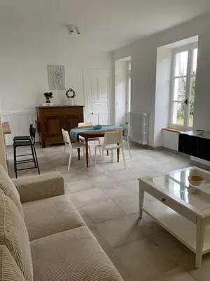 Coin salon dans l'établissement Clos des Chardons - Le Jardin