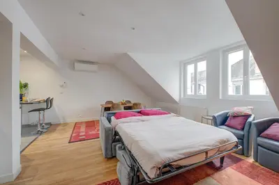 Un ou plusieurs lits dans un hébergement de l'établissement Appartement Confort, Hyper Centre à Tours, Climatisation