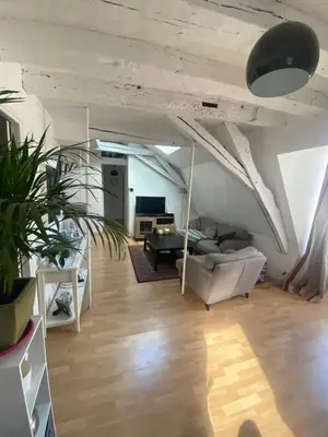Coin salon dans l'établissement TOURS quartier halles 70m2