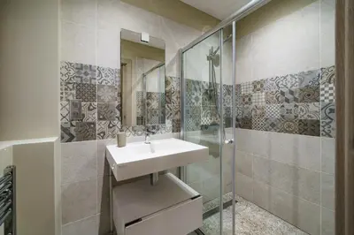 Salle de bains dans l'établissement La cour du grand marché