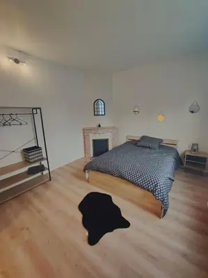Un ou plusieurs lits dans un hébergement de l'établissement Maison 8 couchages