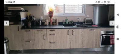 Cuisine ou kitchenette dans l'établissement Maison pour location de chambre circuit 24H et GP
