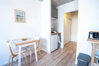 Cuisine ou kitchenette dans l'établissement Appartement Le Cocooning