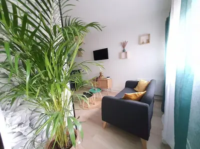 Coin salon dans l'établissement Le Ouistiti - 50 m de la Gare - Parking Privé