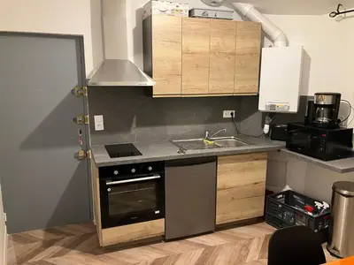 Cuisine ou kitchenette dans l'établissement Grand Studio proche st pierre/château