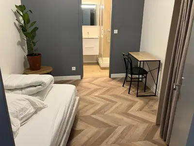 Coin salon dans l'établissement Grand Studio proche st pierre/château